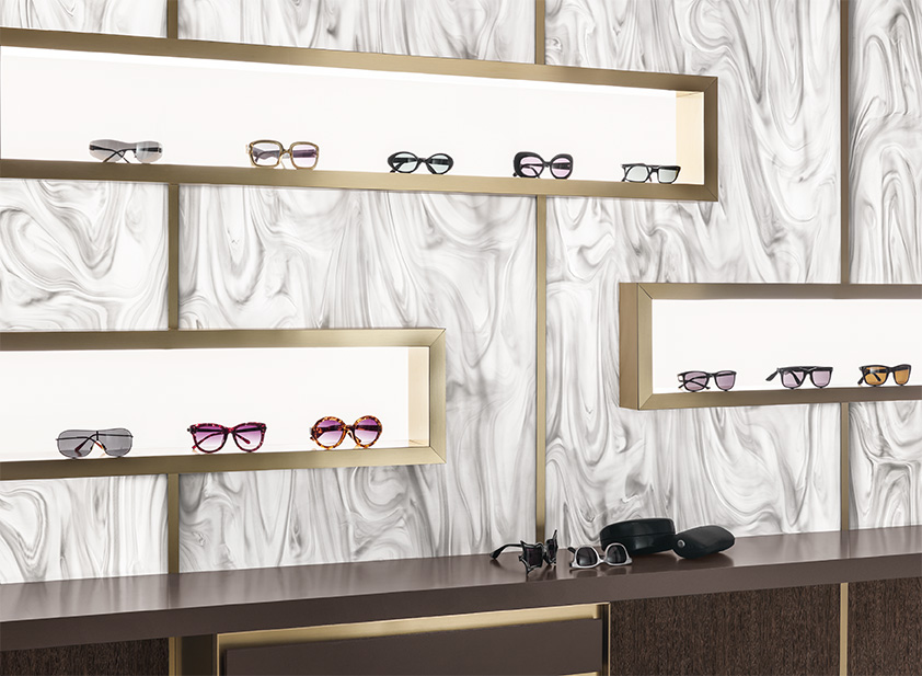 sites/corian-us.telkeadev.lu/IMG/jpg/grey_onxy_backlit_eyeglass_store_3.jpg